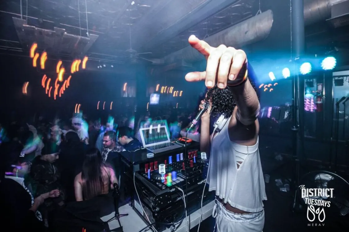 Pointing at the crowd, District Tuesdays