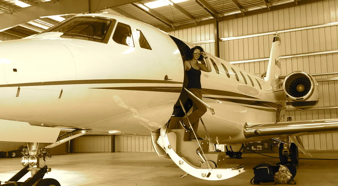 Stepping off a private jet, on the way to a gig
