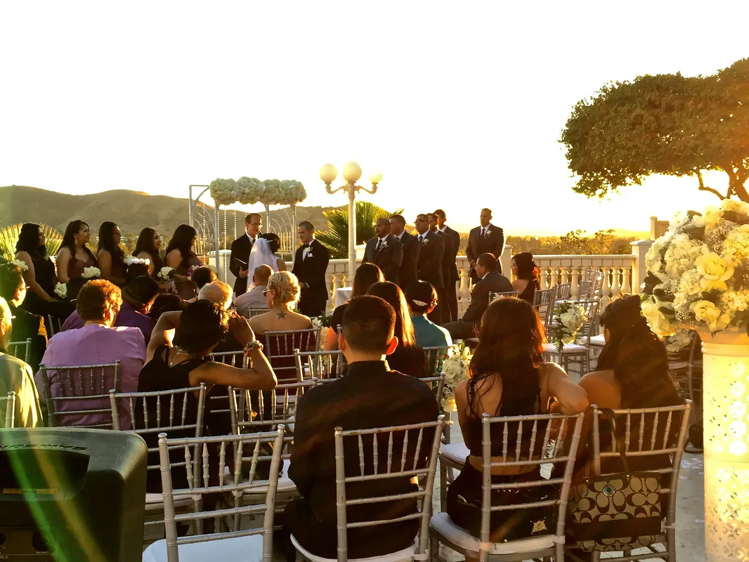 Hillside ceremony at golden hour